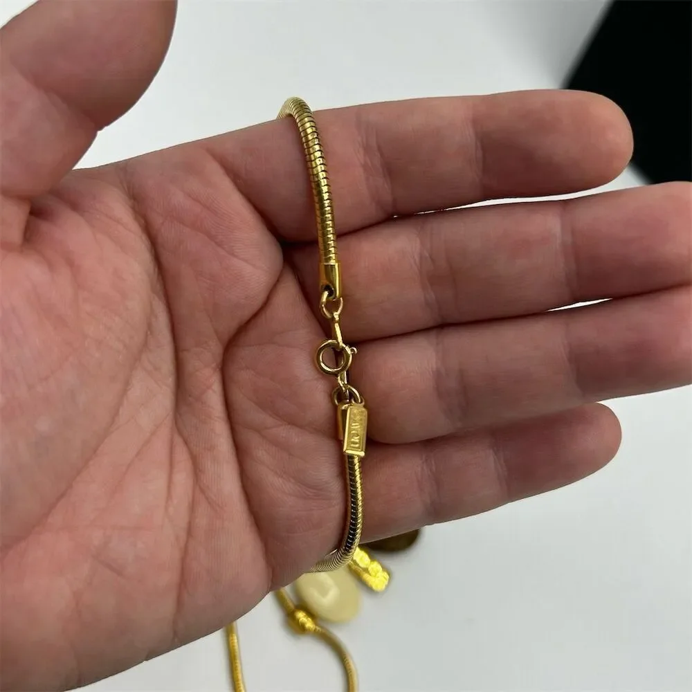 Vintage Avon Gold Tone Oval Pendant Necklace 24